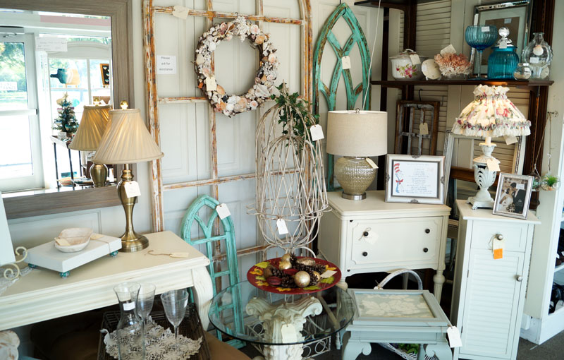 Antique booth with shelves of collectibles
